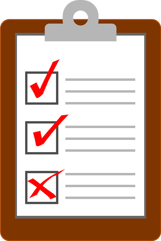  clipboard with lined paper and red checkmarks