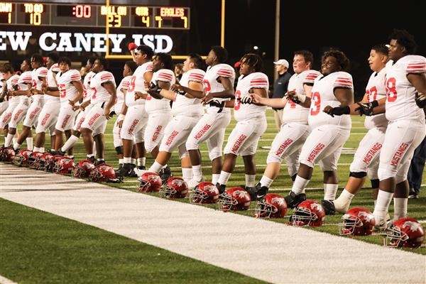 Football team lined up for victory song