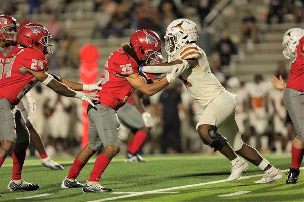 Number 35 pushing back Dobie player
