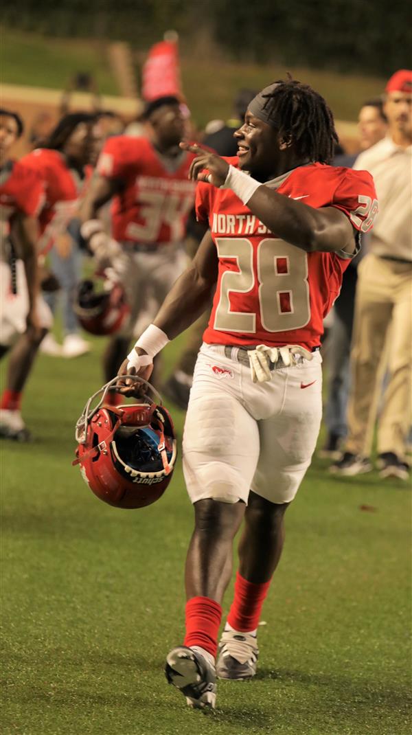 De-Andre Hardeman walking off the field after the win
